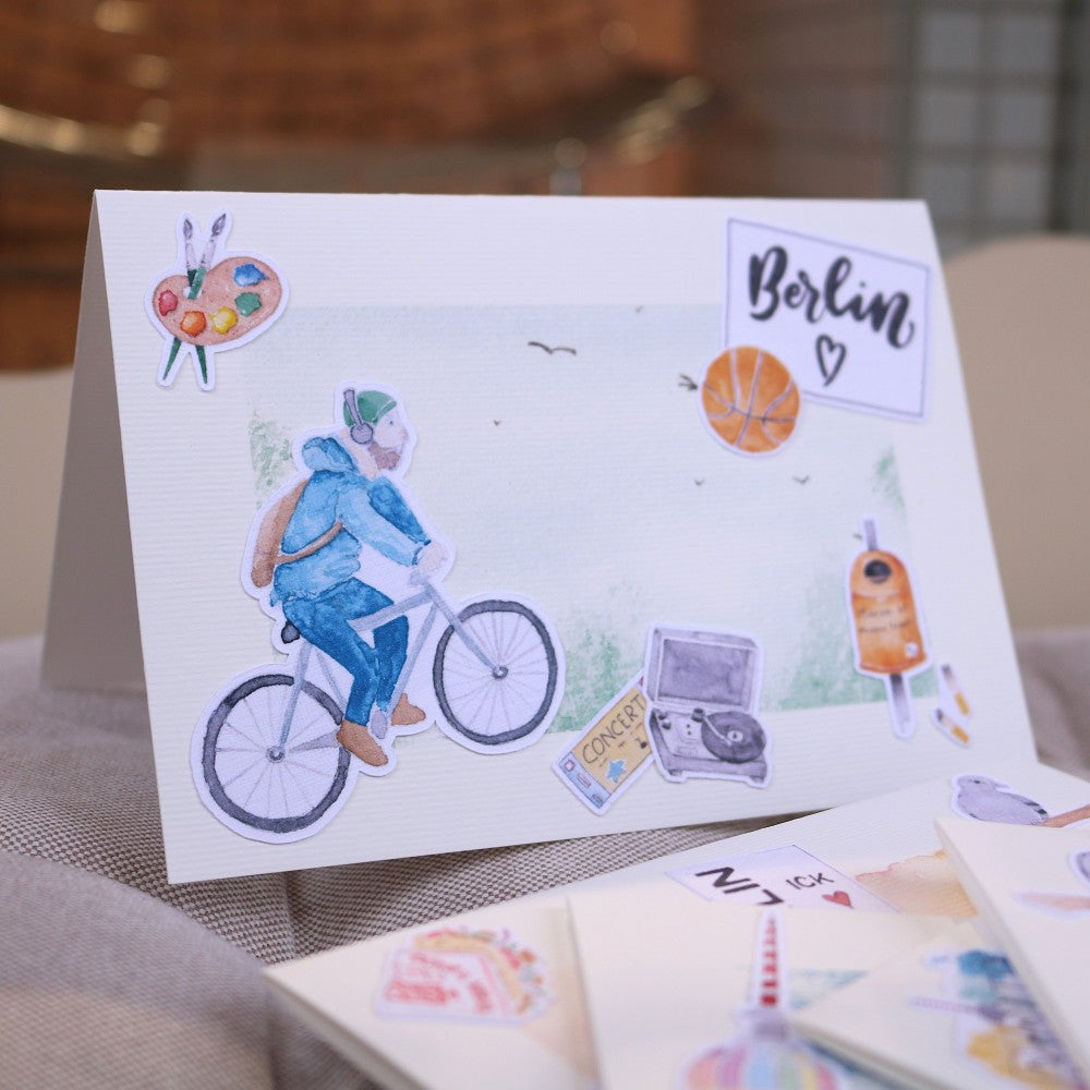 Klappkarte Berlin mit Fahradfahrer, Plattenspieler und Berlin Schriftzug