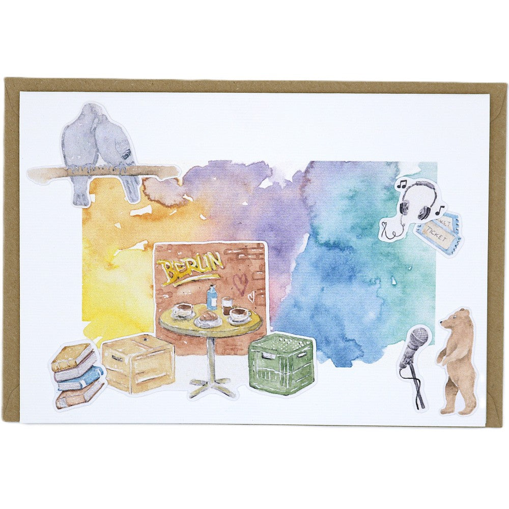 Berlin Grusskarte A6 mit Aquarellillustrationen eines Cafétischs, Berliner Alltagsobjekten und buntem Farbverlauf, mit Umschlag.
