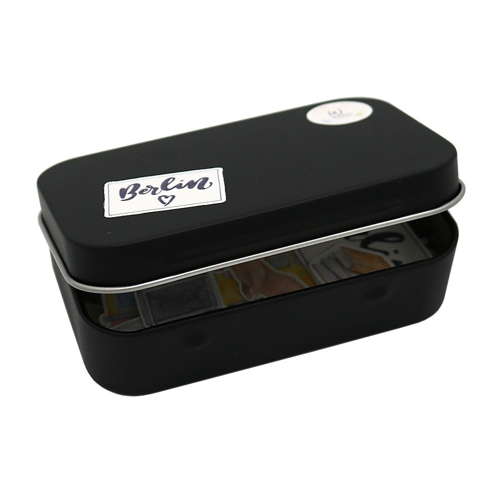 Geschlossene schwarze Metallbox mit selbstklebenden Mini-Aquarell-Stickern mit Berlin-Motiven