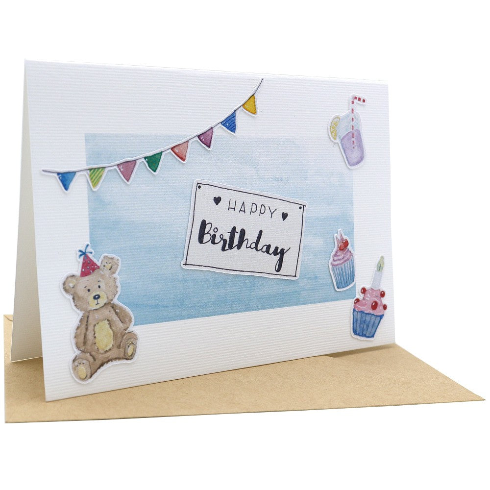 Aquarell-Klappkarte zum Geburtstag mit Wimpelkette, Teddybär, Cupcakes und Schriftzug „Happy Birthday“ auf blauem Farbverlauf