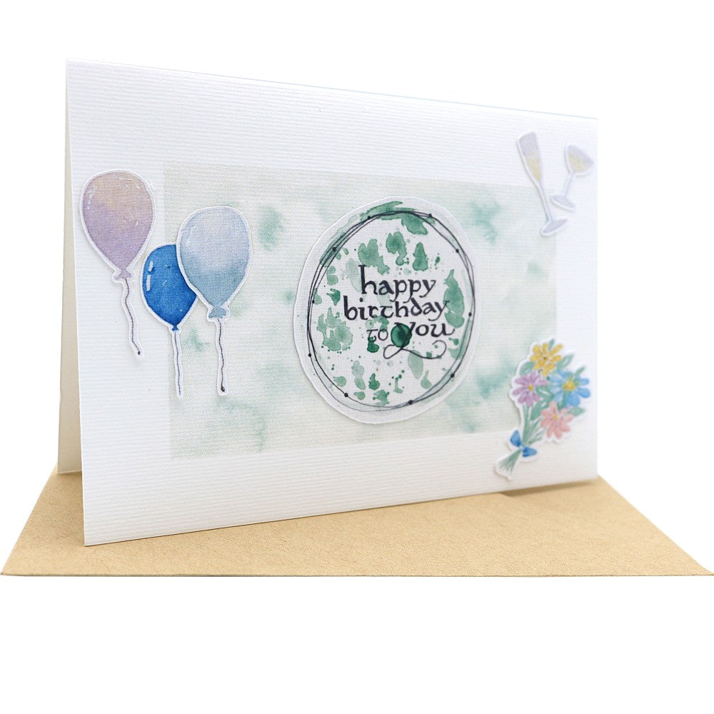 Aquarell-Klappkarte zum Geburtstag mit Luftballons, Blumenstrauß und Schriftzug „happy birthday to you“ auf grünlichem Farbverlauf