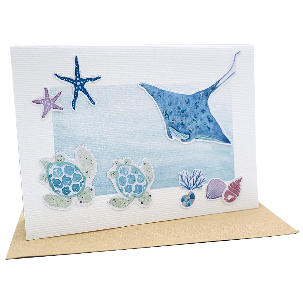 Klappkarte mit Meeresmotiven wie Schildkröten und Rochen und Seesternen