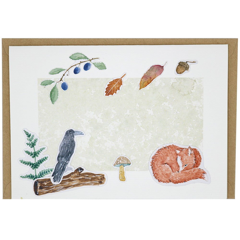 Grusskarte Waldbewohner auf Aquarellhintergrund mit Fuchs und Rabe und Blättern